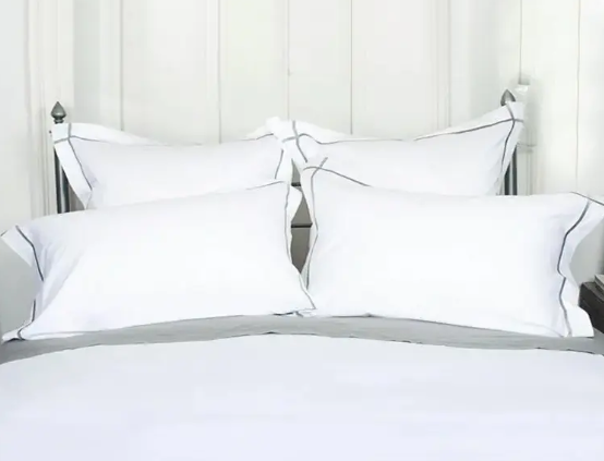 Co mohu udělat, když se z hotelu prosté bavlněné sateen listy zvětrnou a při každém myčku se stají tužší?